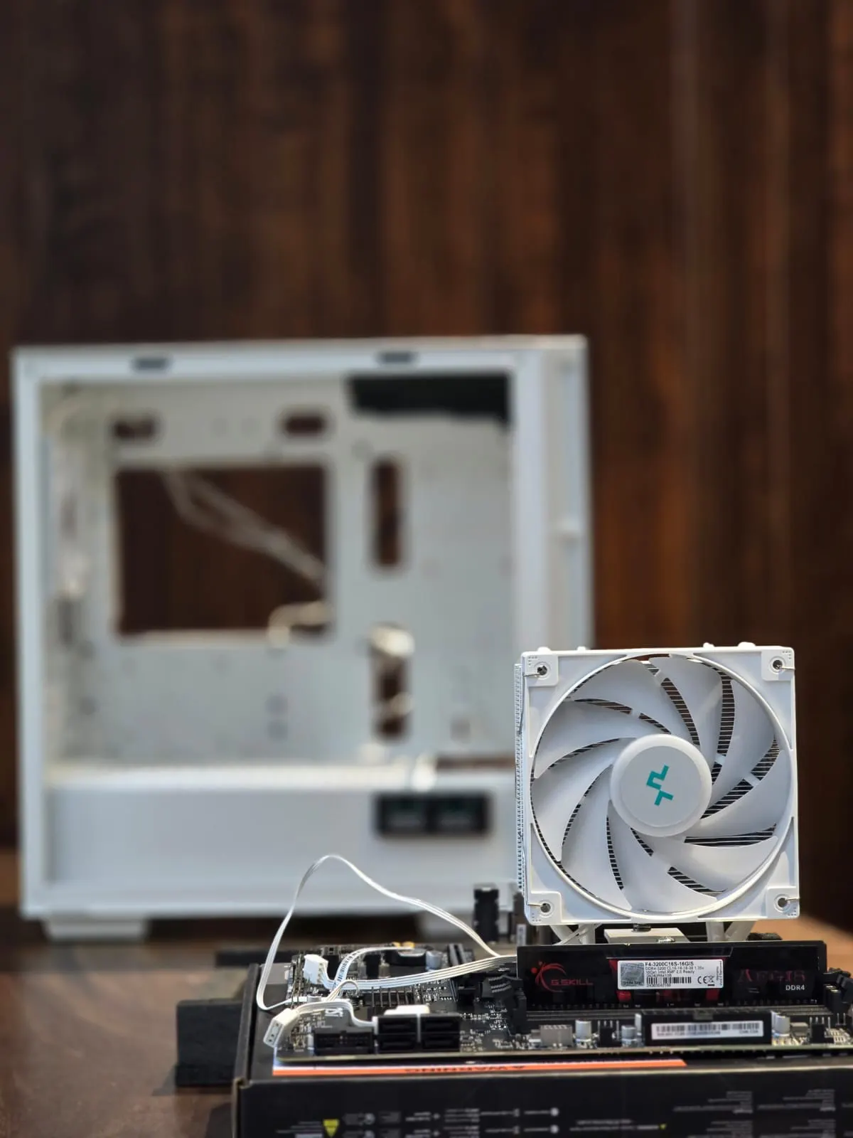 A build in progress on the shop bench - air cooler mounted on the motherboard